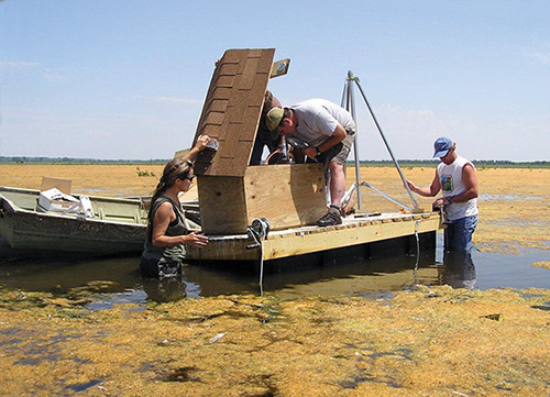 Emiquon Crew Installing Water Quality Instruments